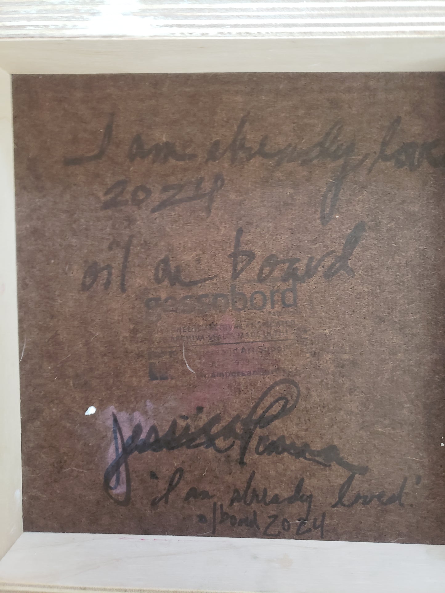 Signature on a brown background with text