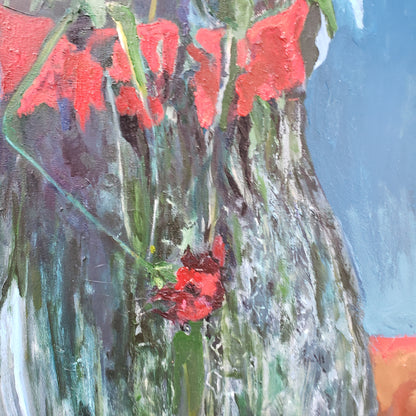 Abstract oil painting with red flowers and green foliage on a blue background