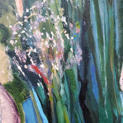Close-up of an abstract oil painting with green, blue, and red flower hues.